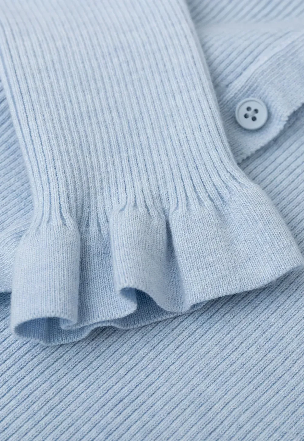 Ribbed Knit Cardigan with Bow Tie Neck and Ruffled Placket