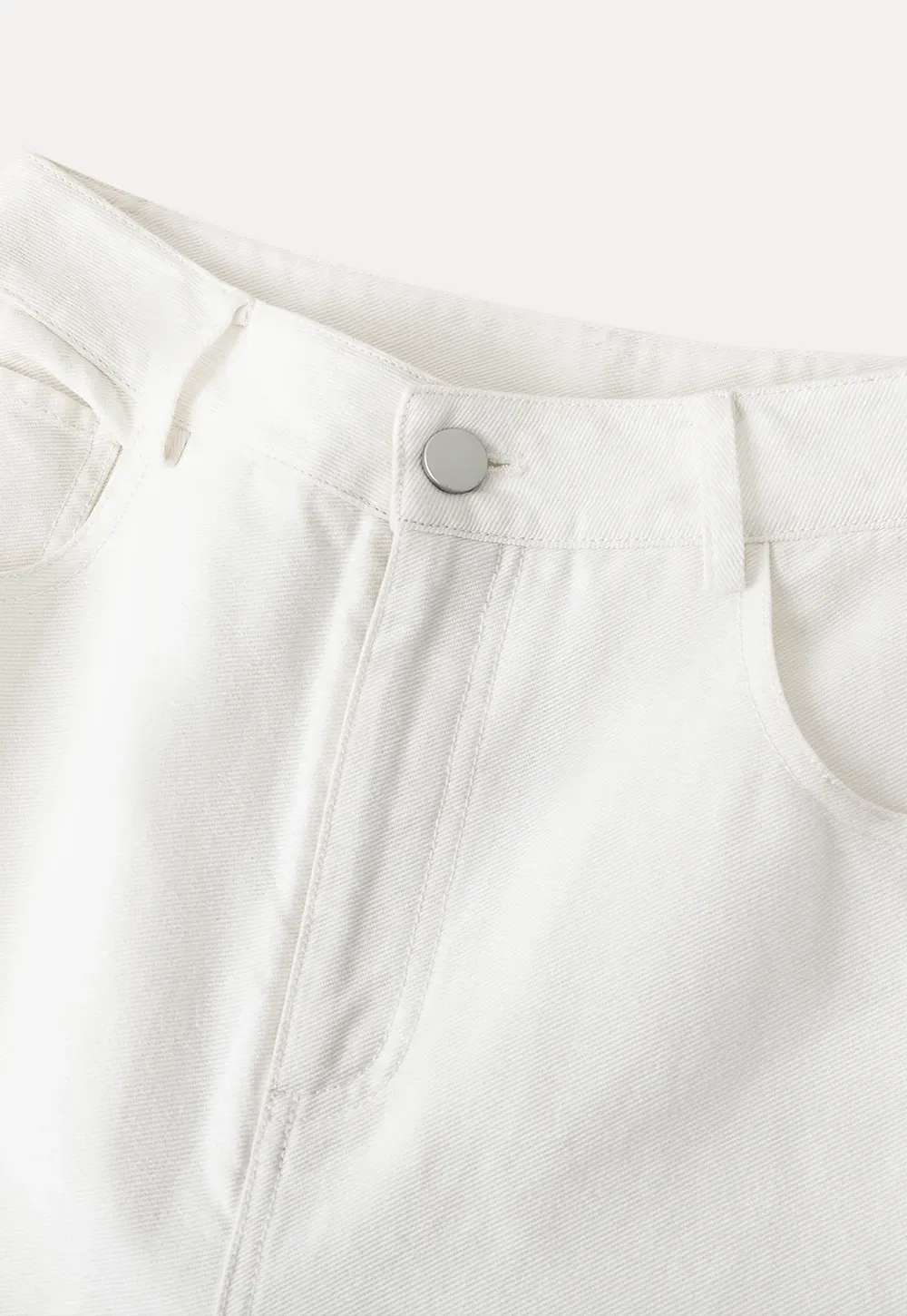 Wide leg jeans with embroidered hem details