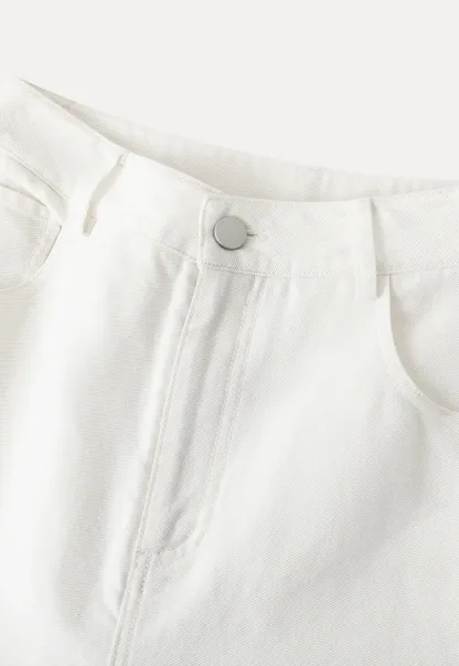 Wide leg jeans with embroidered hem details