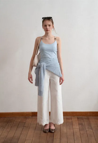 Wide leg jeans with embroidered hem details