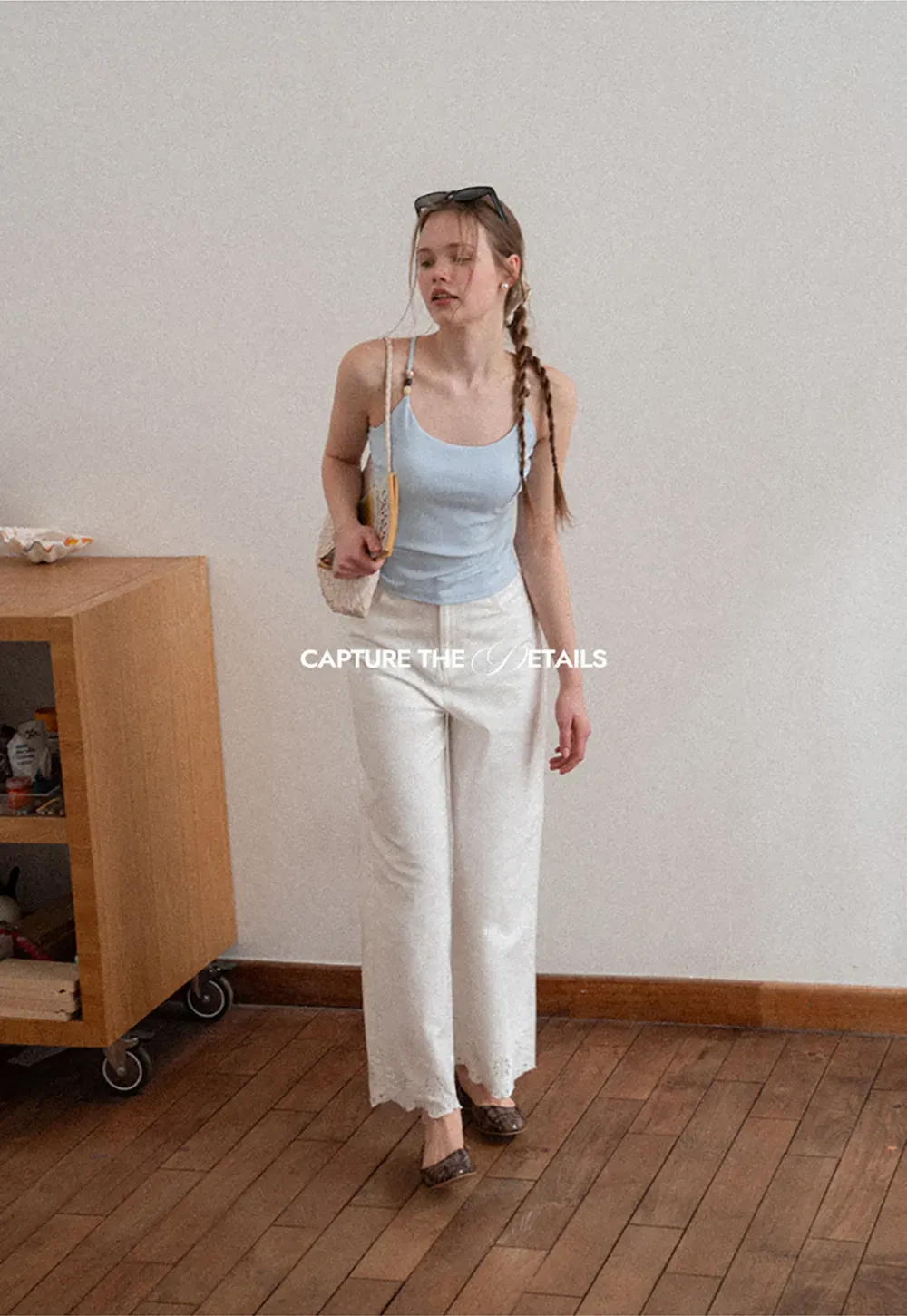 Wide leg jeans with embroidered hem details