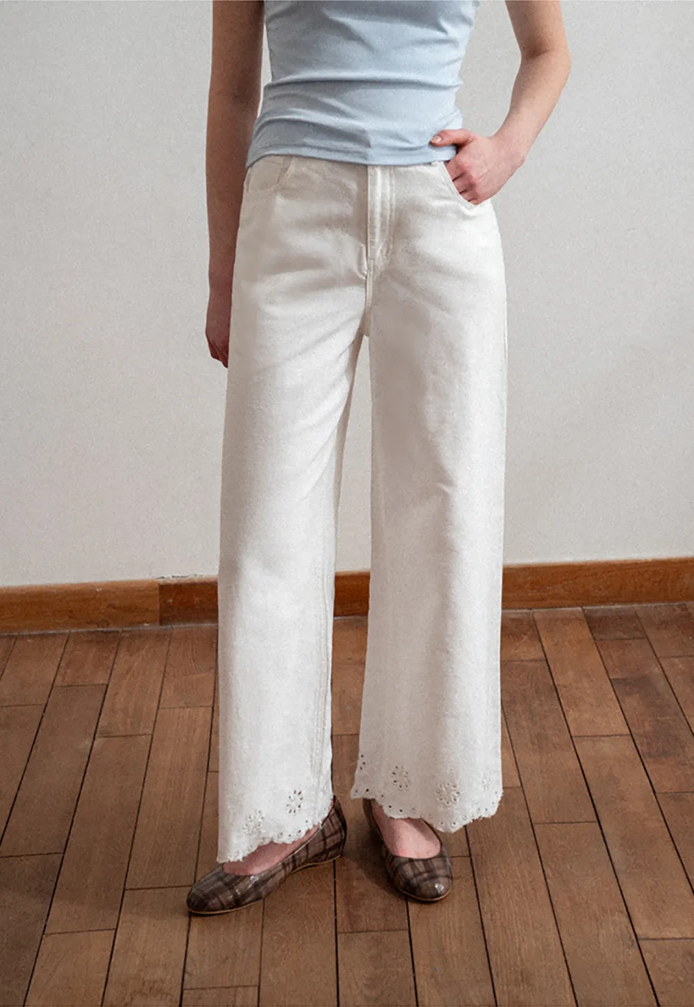 Wide leg jeans with embroidered hem details