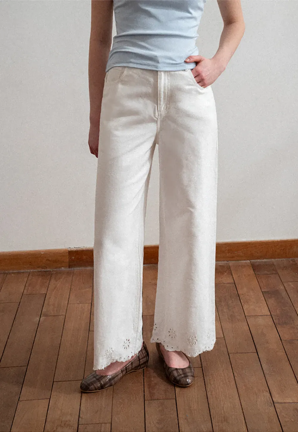 Wide leg jeans with embroidered hem details