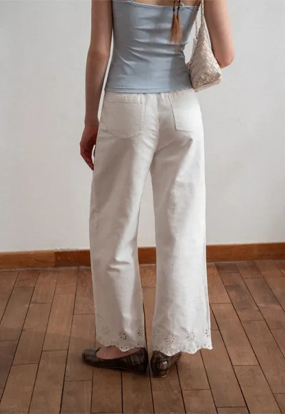 Wide leg jeans with embroidered hem details