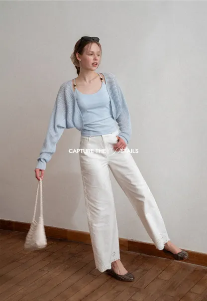 Wide leg jeans with embroidered hem details