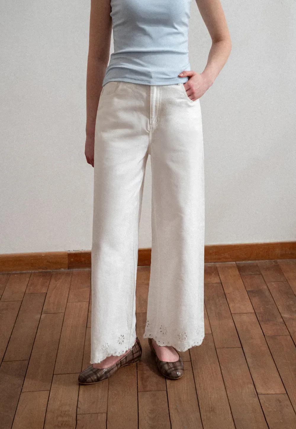 Wide leg jeans with embroidered hem details