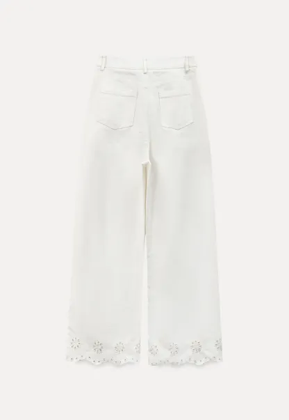 Wide leg jeans with embroidered hem details