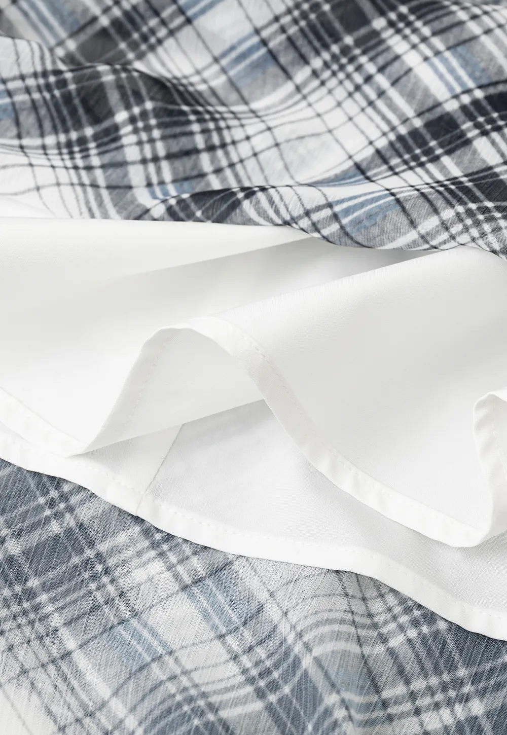 Plaid Skirt with Ruffled Hem and Asymmetrical Design