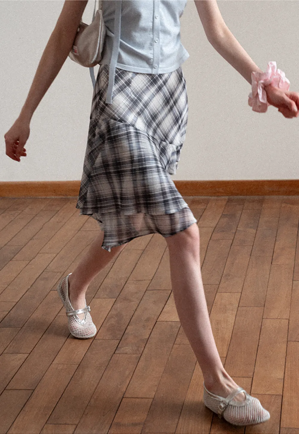 Plaid Skirt with Ruffled Hem and Asymmetrical Design