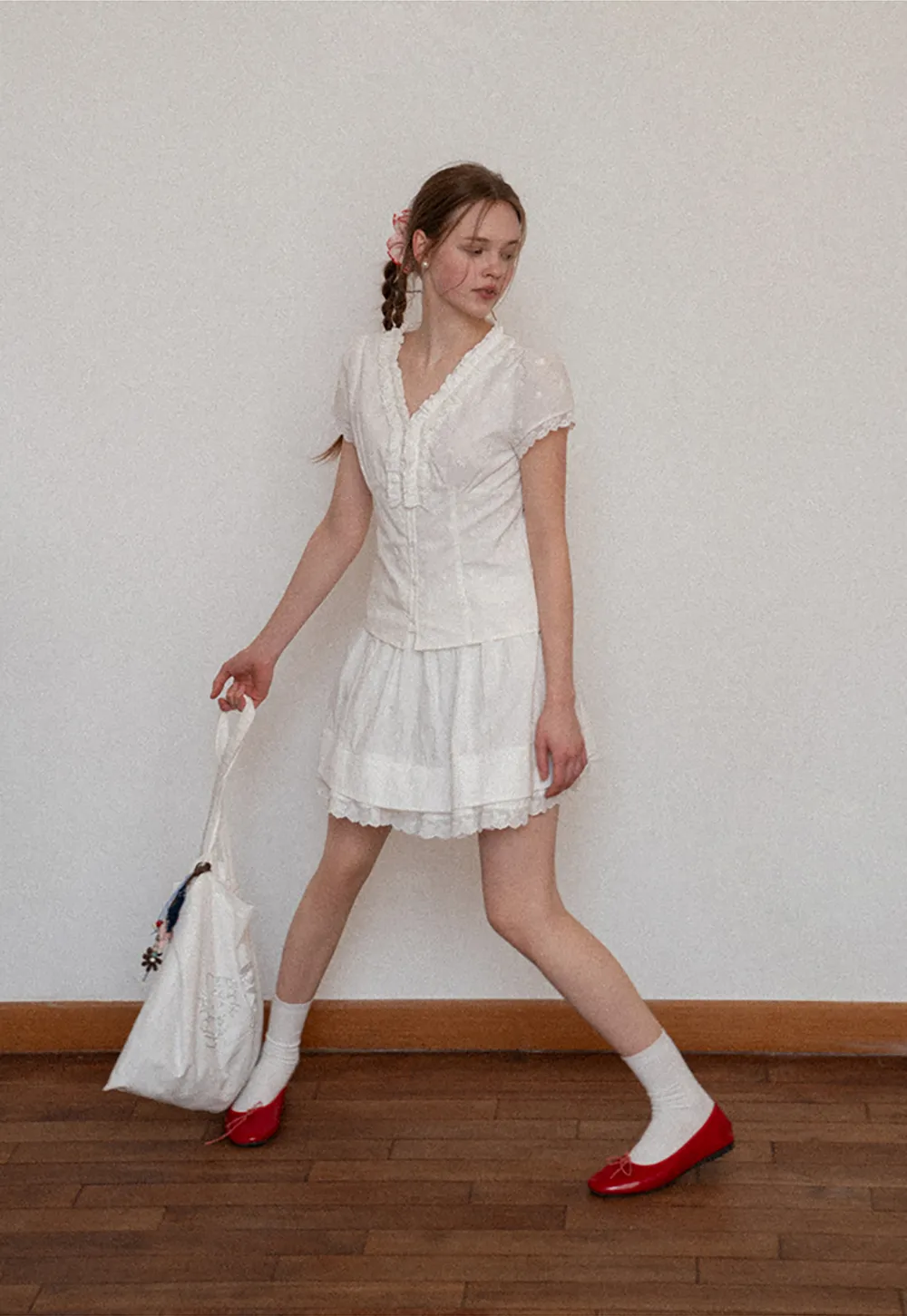 Tiered skirt with lace trim and gathered waist