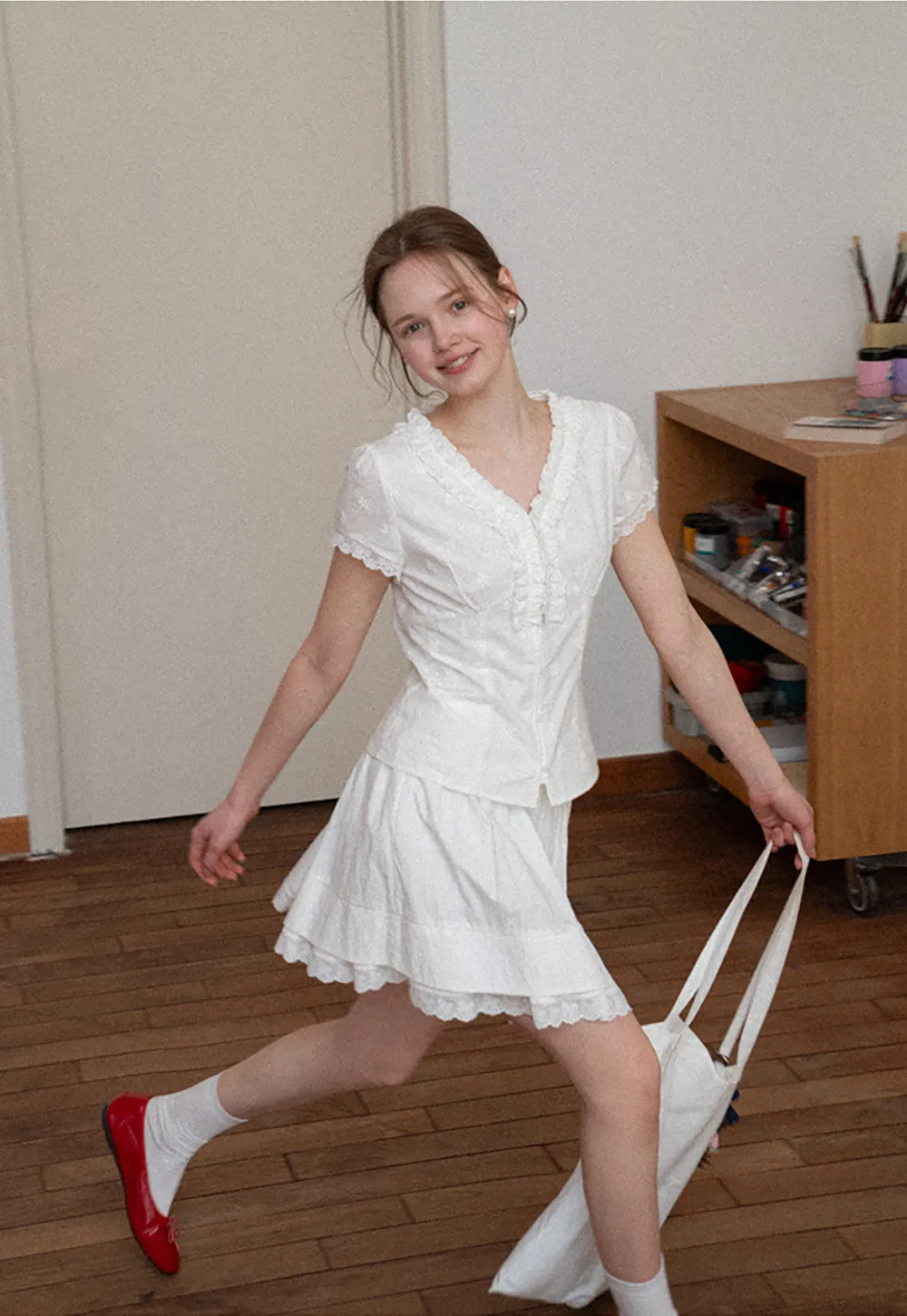 Tiered skirt with lace trim and gathered waist