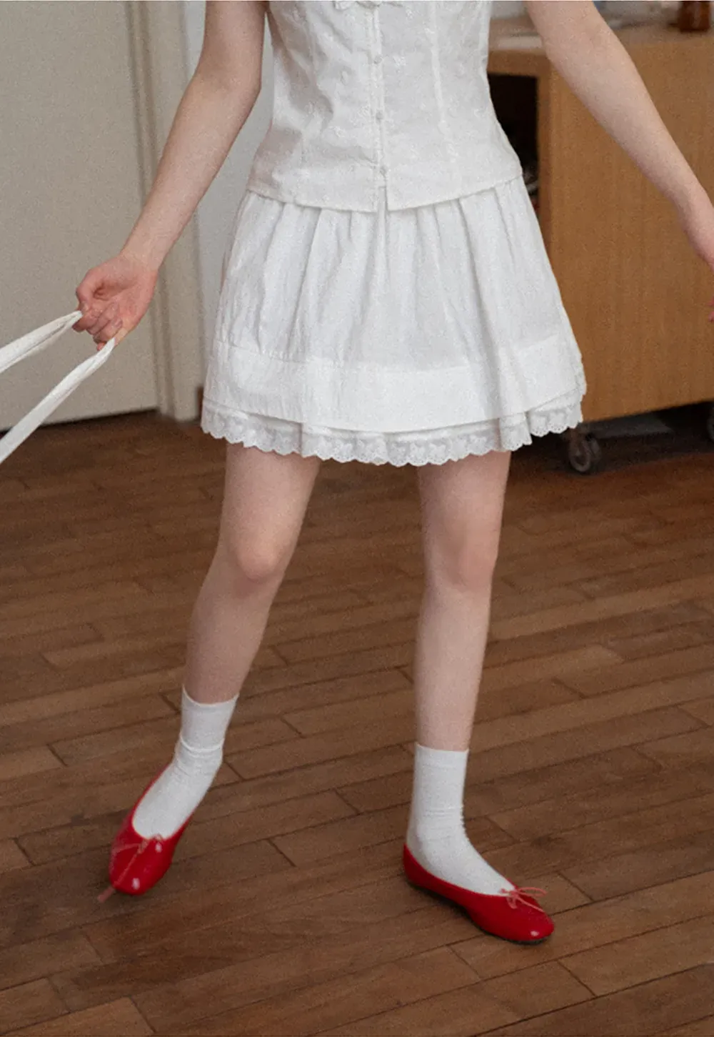 Tiered skirt with lace trim and gathered waist