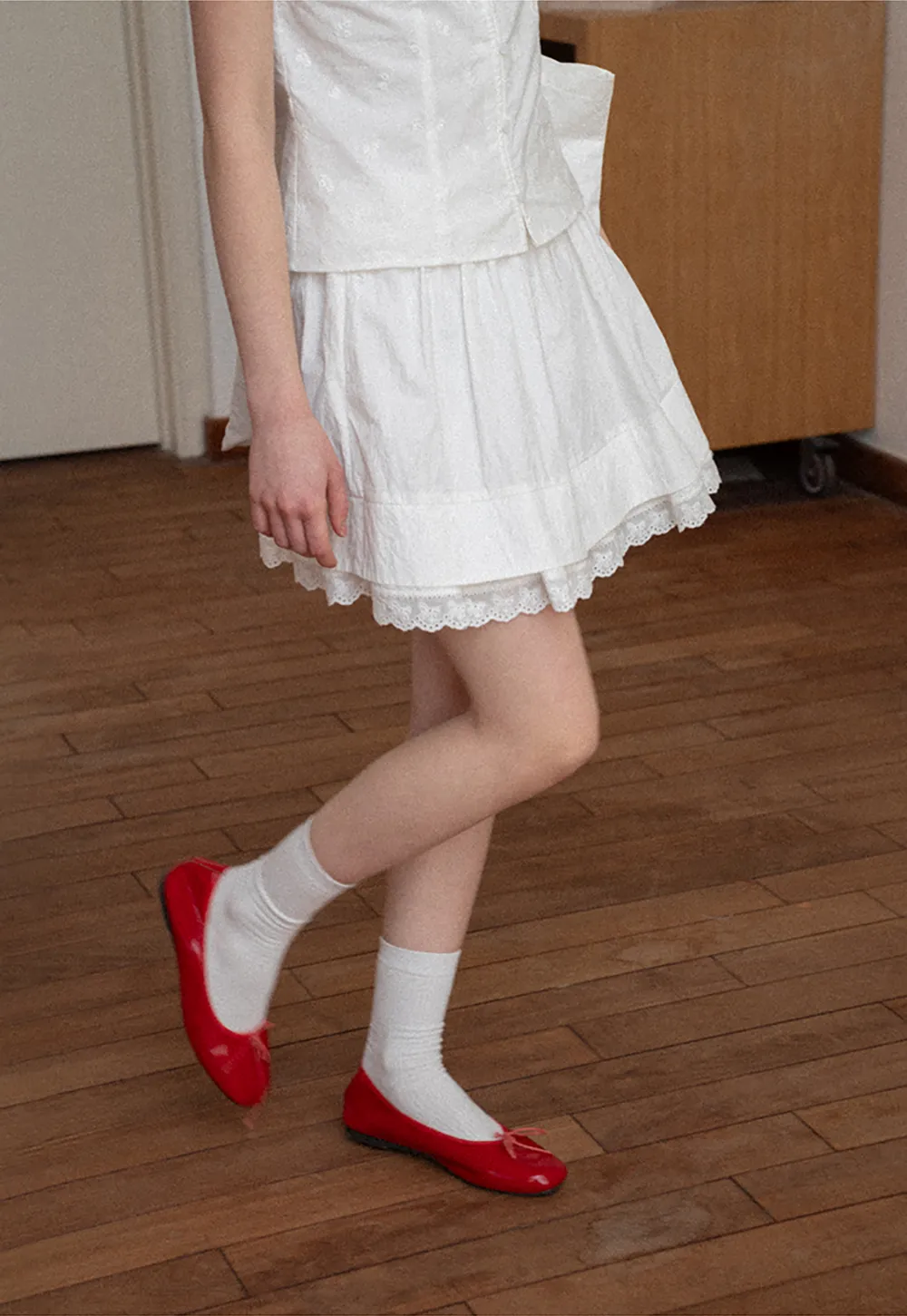 Tiered skirt with lace trim and gathered waist