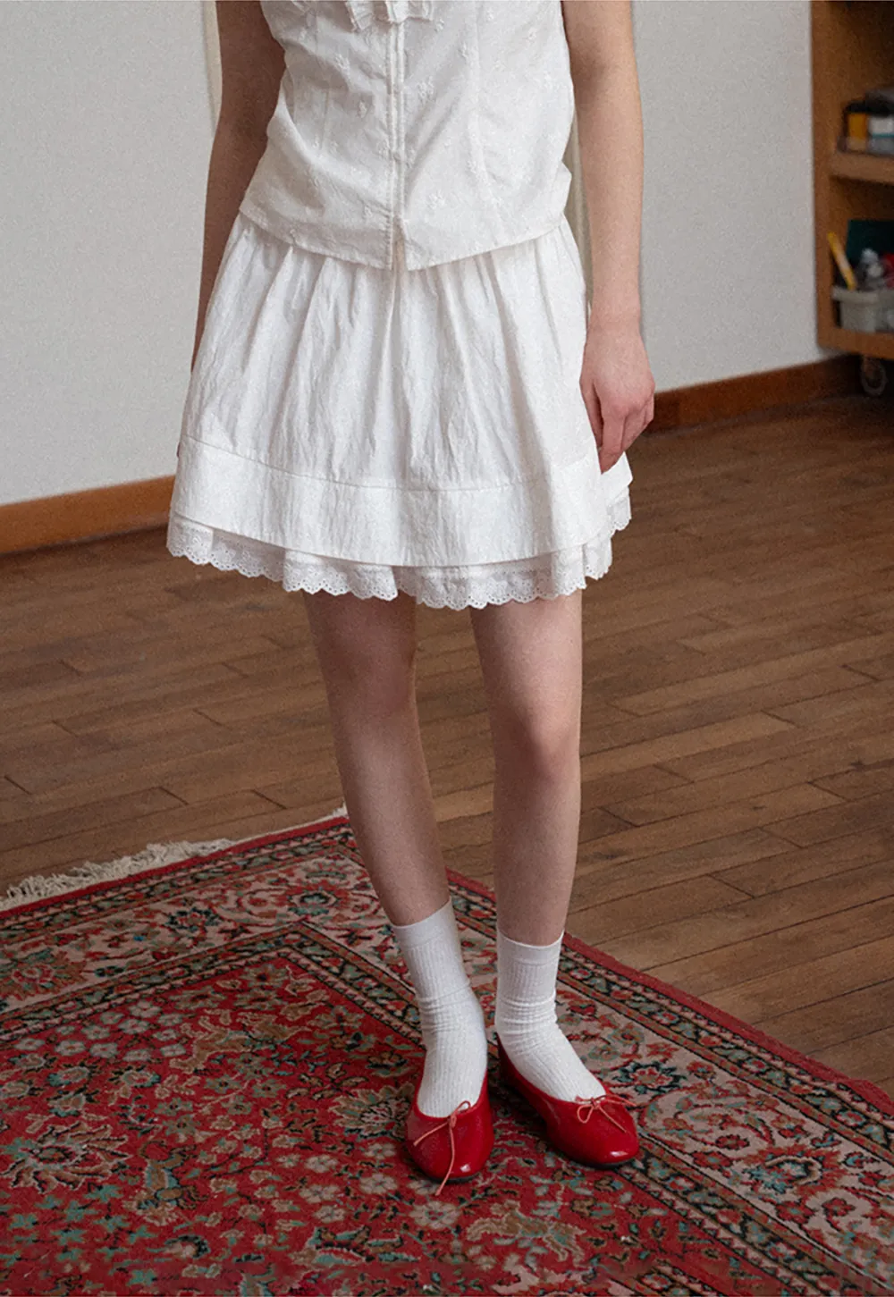 Tiered skirt with lace trim and gathered waist
