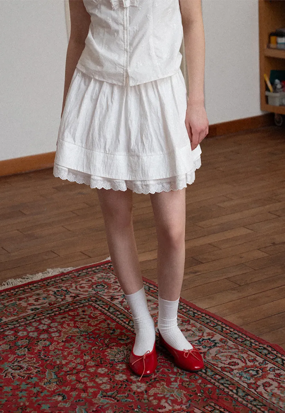 Tiered skirt with lace trim and gathered waist