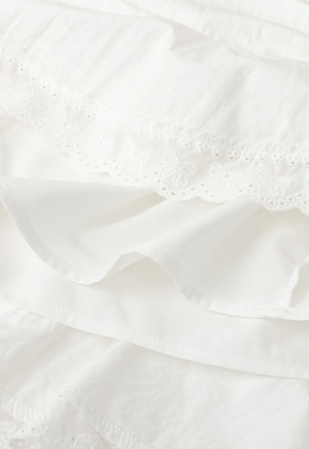 Tiered skirt with lace trim and gathered waist