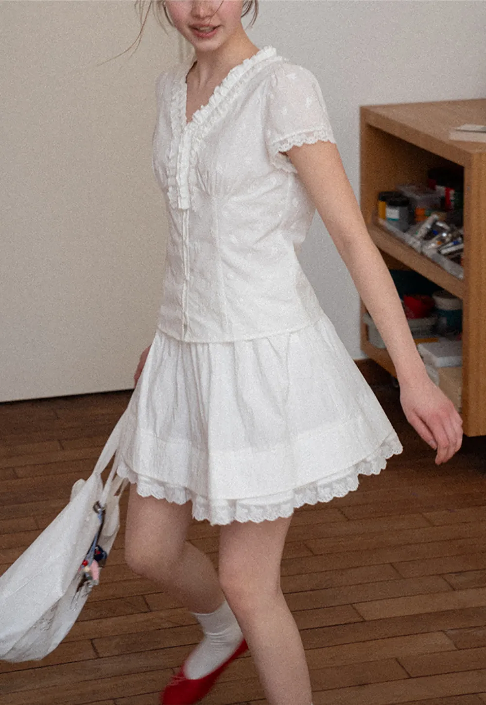 Tiered skirt with lace trim and gathered waist