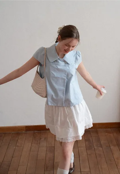 Tiered skirt with lace trim and gathered waist