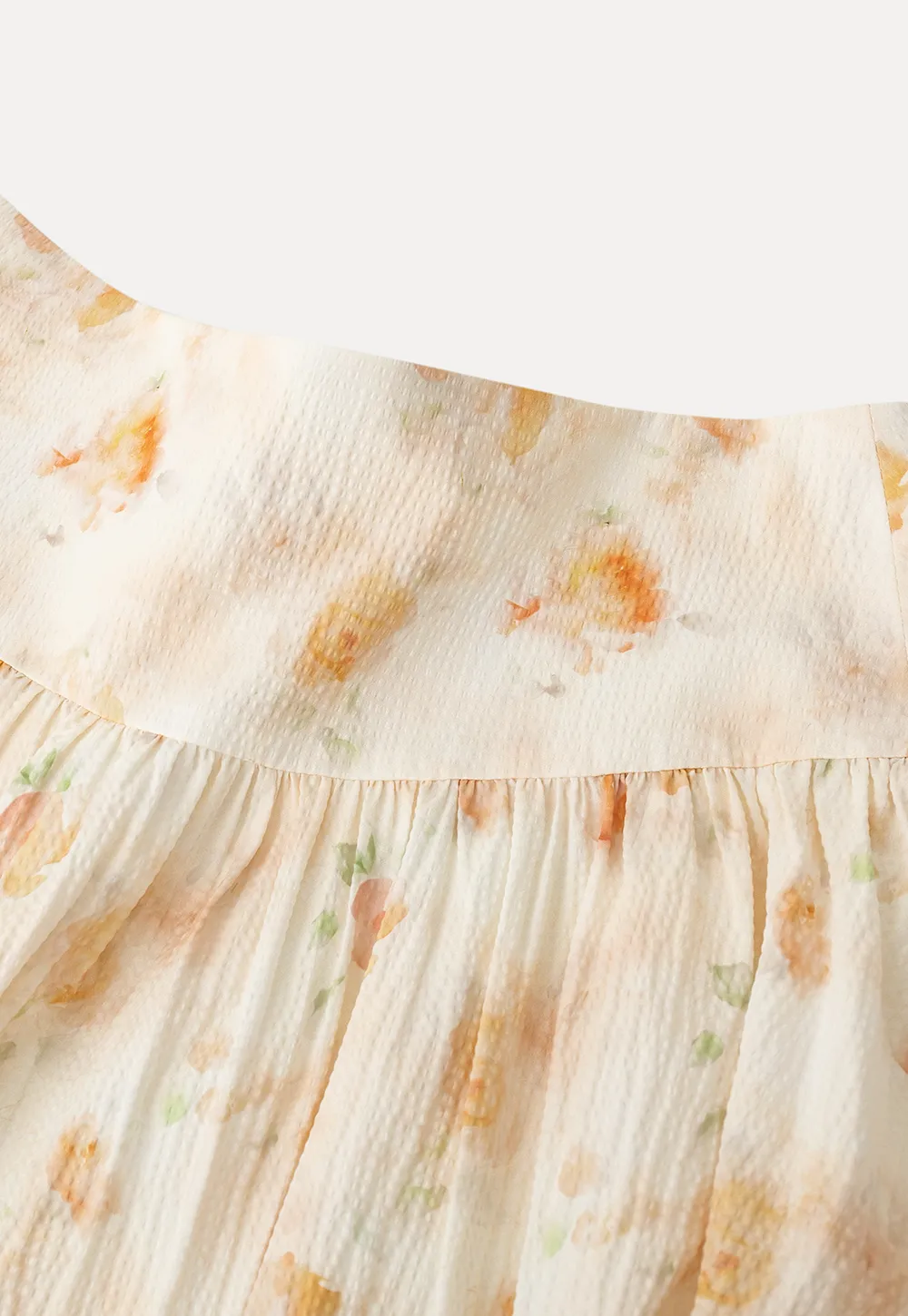 Floral Print Pleated Skirt with Asymmetrical Hem