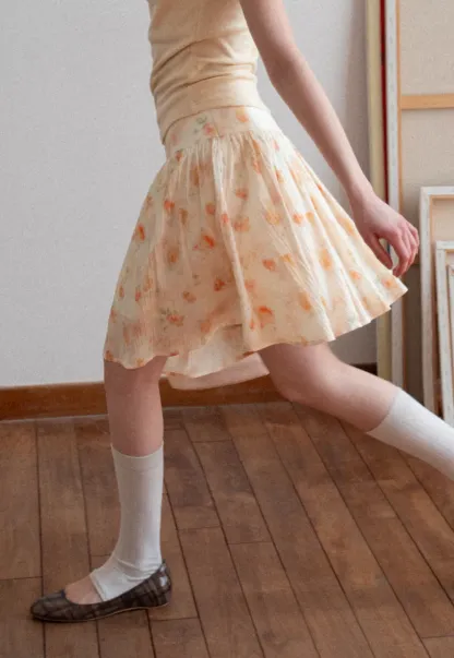 Floral Print Pleated Skirt with Asymmetrical Hem