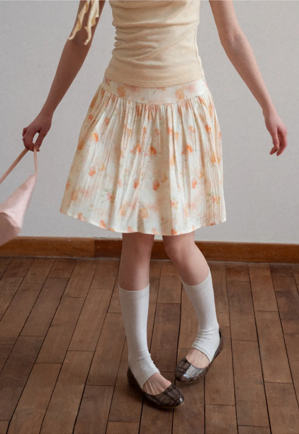 Floral Print Pleated Skirt with Asymmetrical Hem