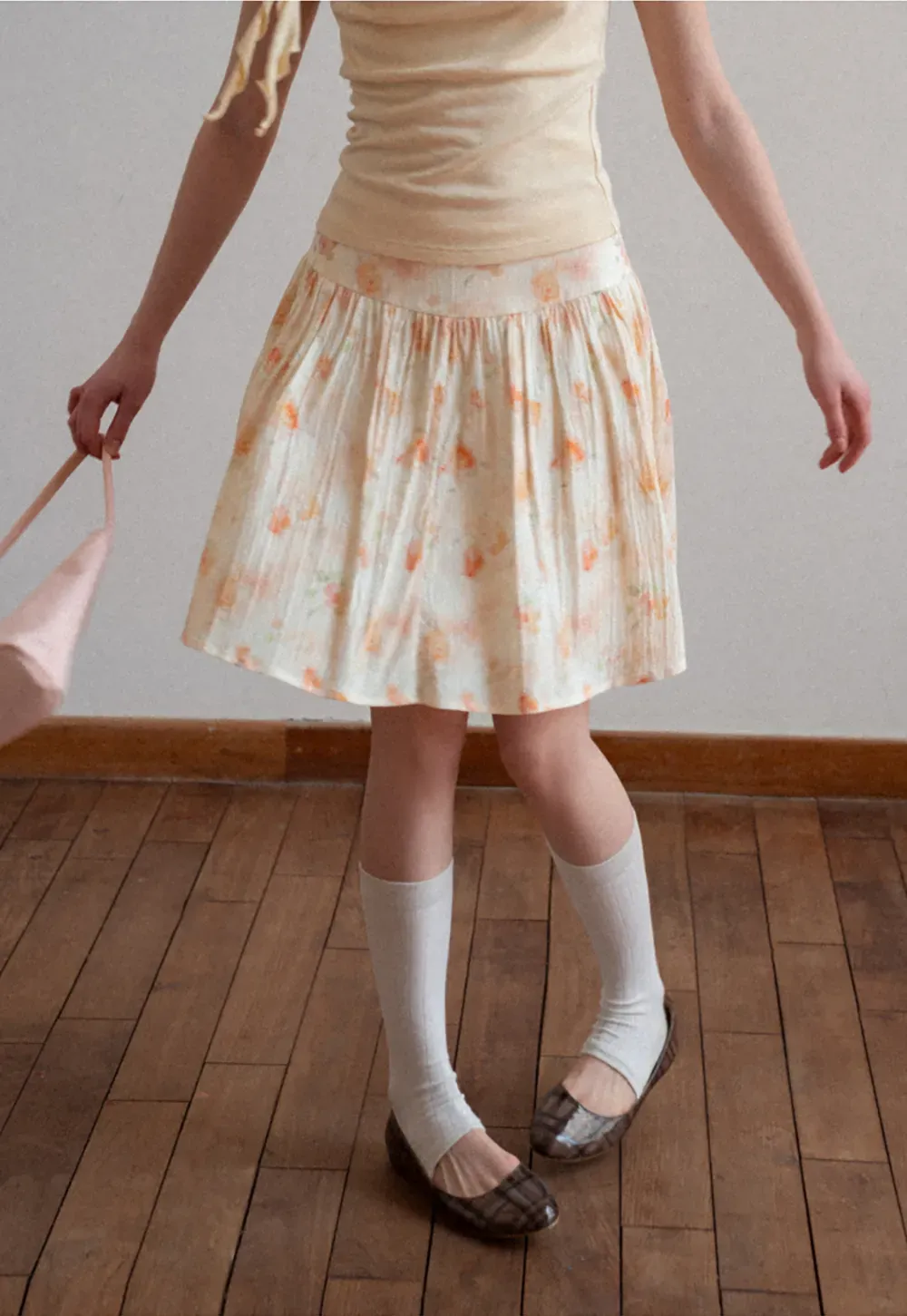 Floral Print Pleated Skirt with Asymmetrical Hem