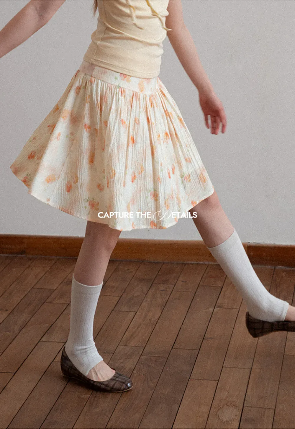 Floral Print Pleated Skirt with Asymmetrical Hem