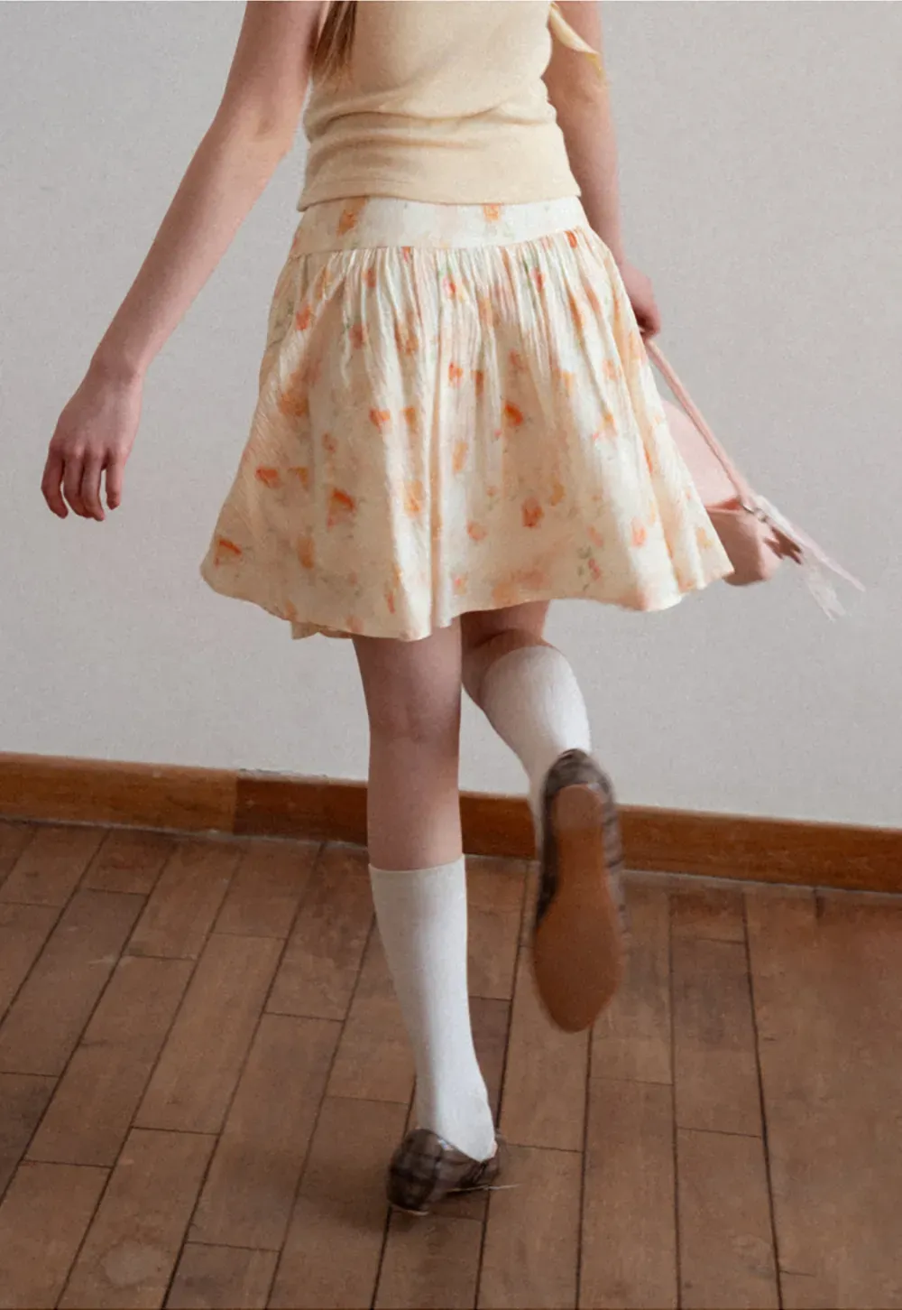 Floral Print Pleated Skirt with Asymmetrical Hem