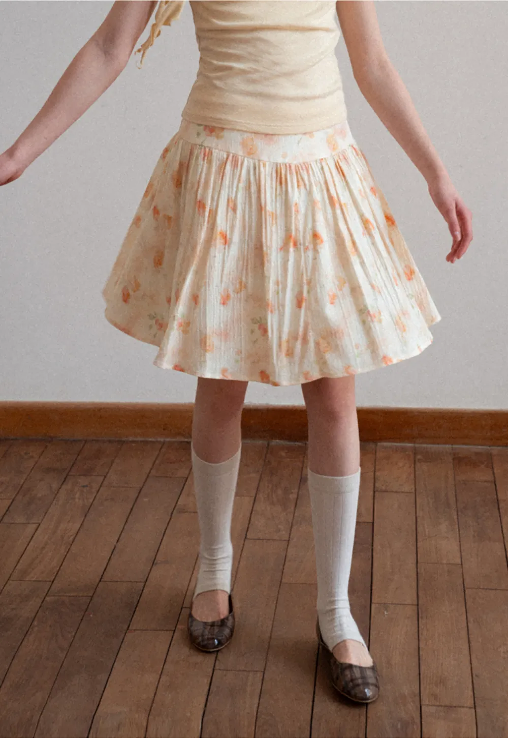 Floral Print Pleated Skirt with Asymmetrical Hem