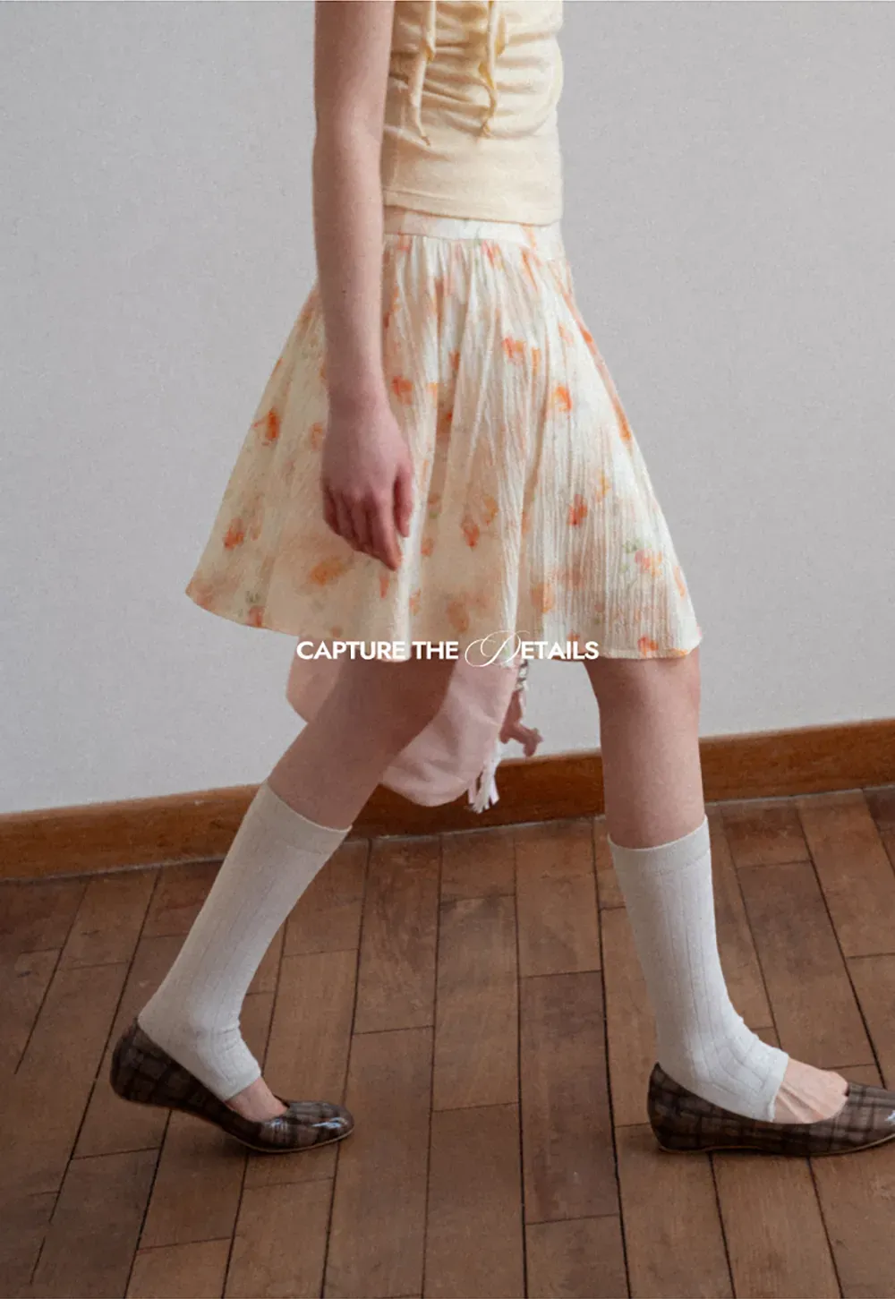 Floral Print Pleated Skirt with Asymmetrical Hem