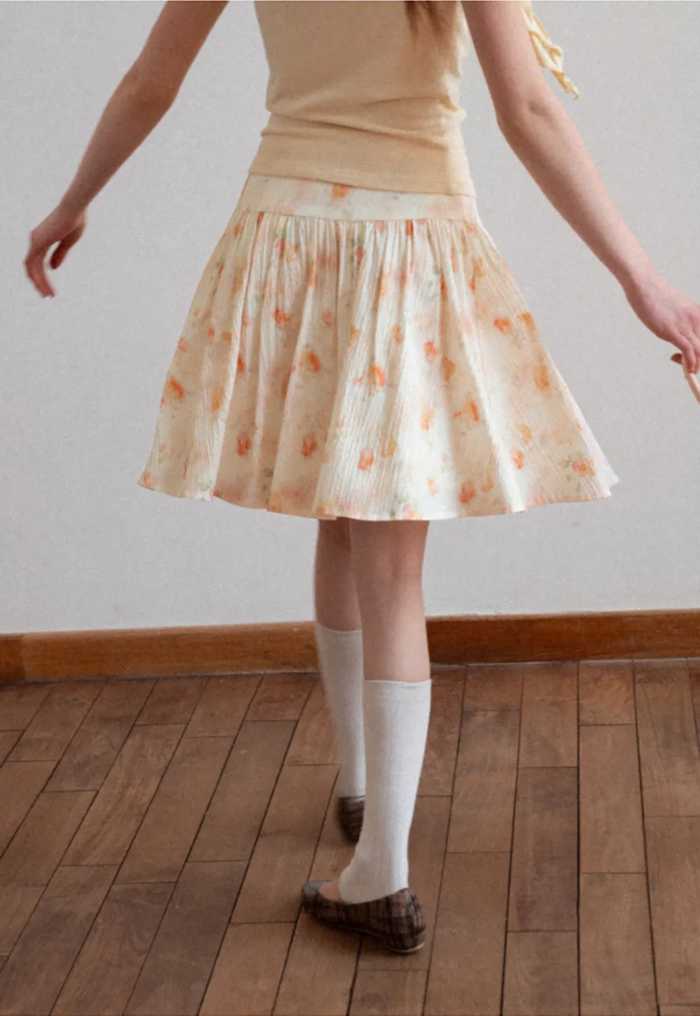 Floral Print Pleated Skirt with Asymmetrical Hem