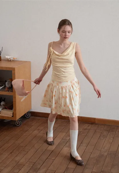 Floral Print Pleated Skirt with Asymmetrical Hem