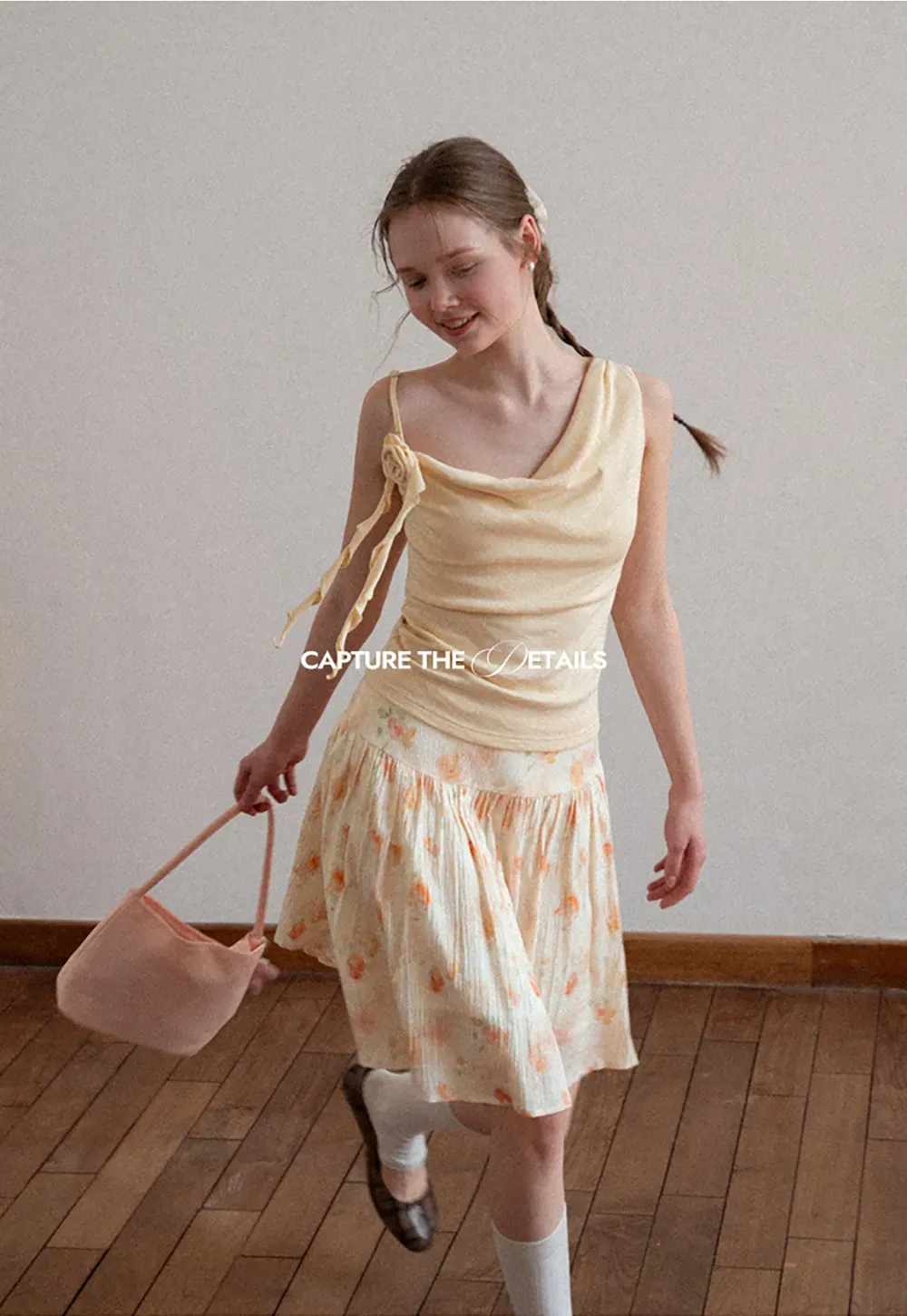 Floral Print Pleated Skirt with Asymmetrical Hem