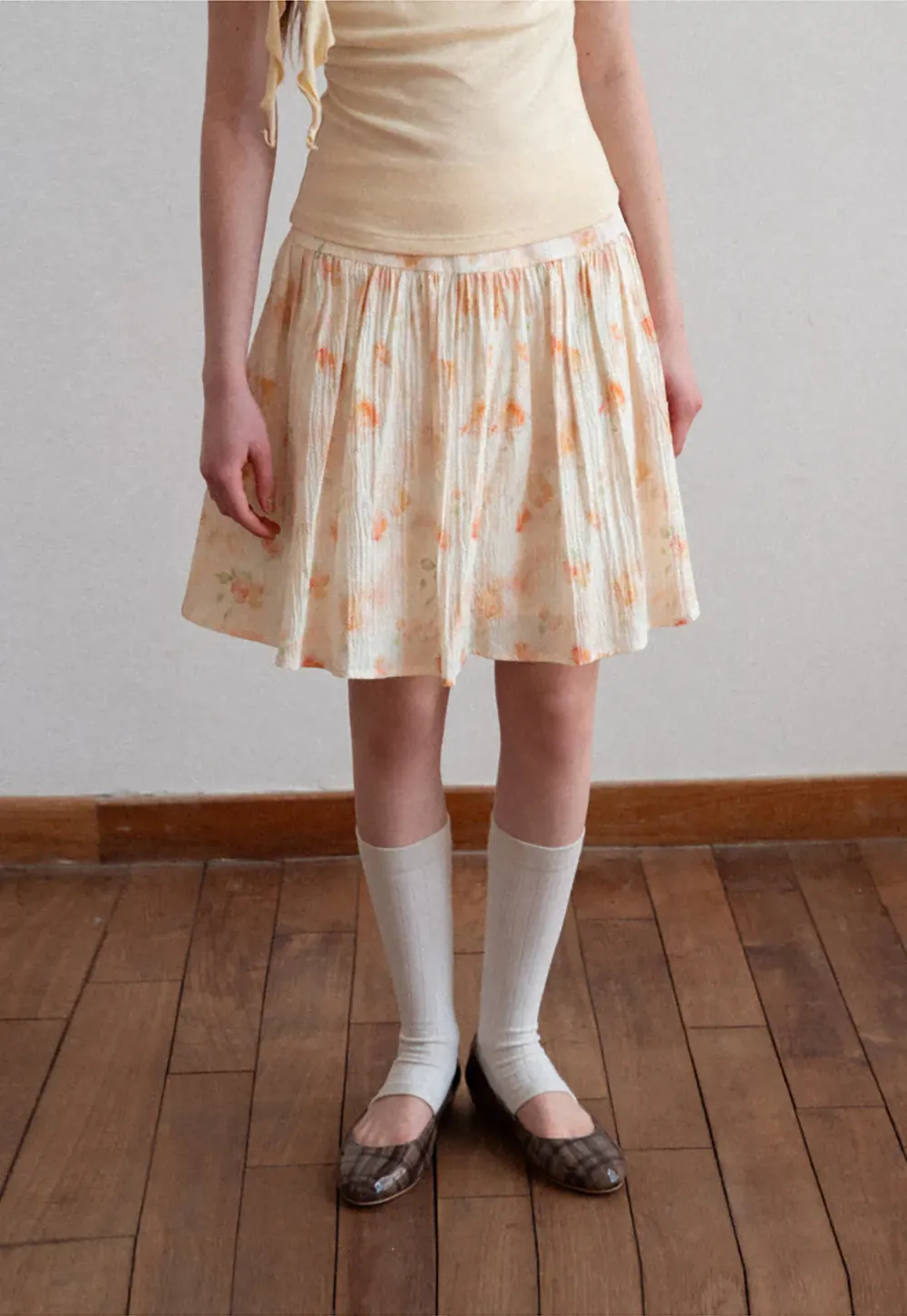 Floral Print Pleated Skirt with Asymmetrical Hem