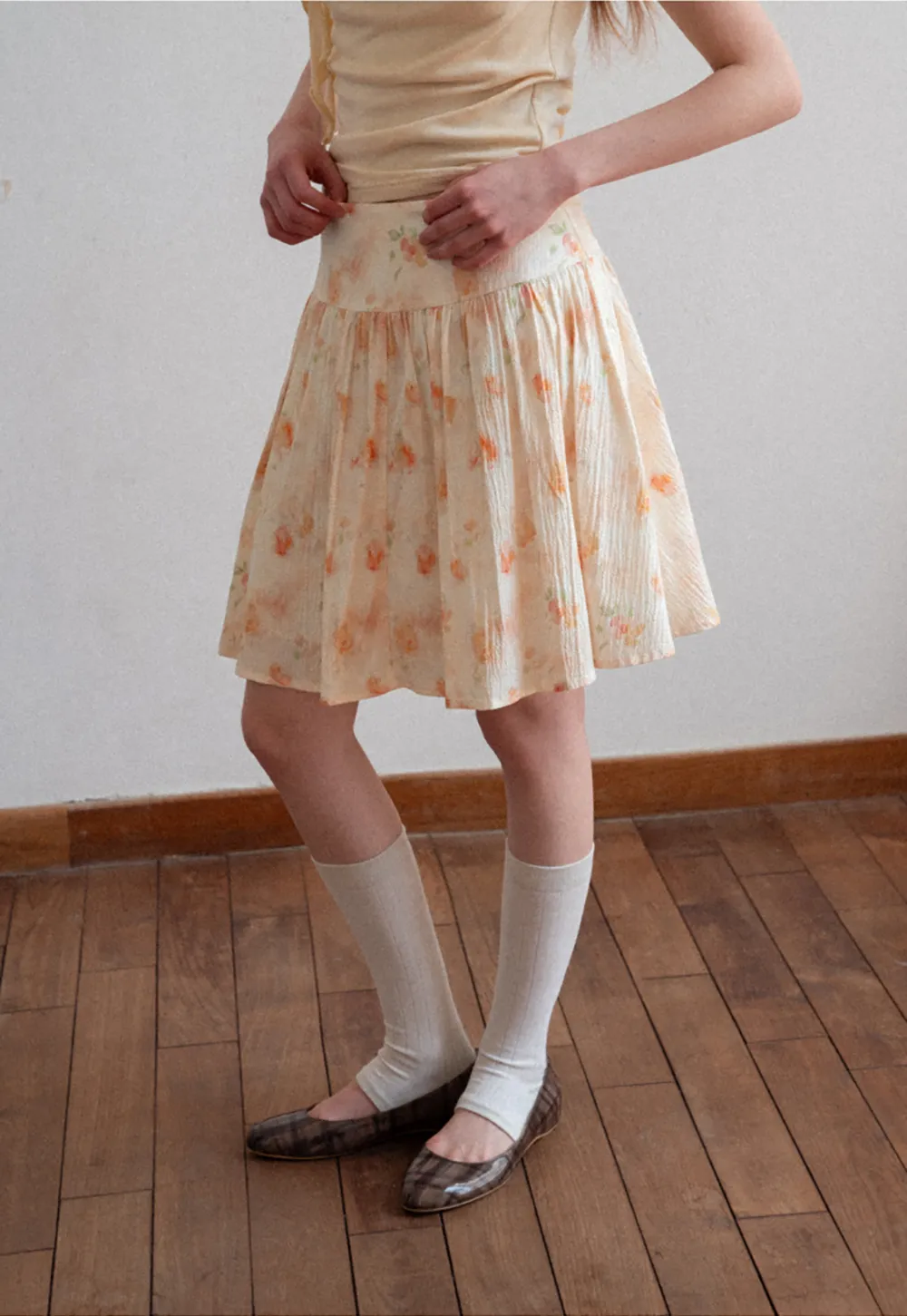 Floral Print Pleated Skirt with Asymmetrical Hem