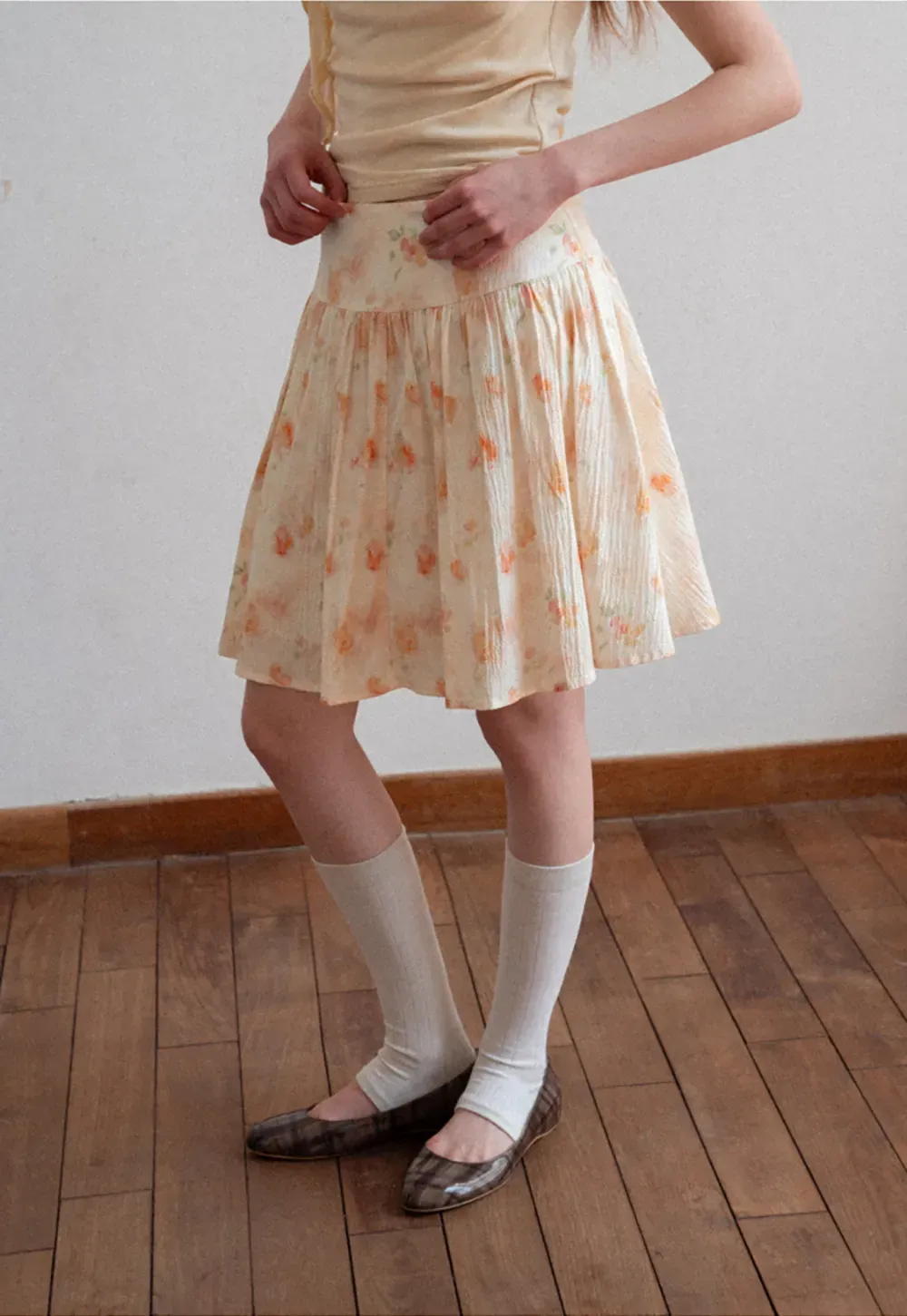 Floral Print Pleated Skirt with Asymmetrical Hem