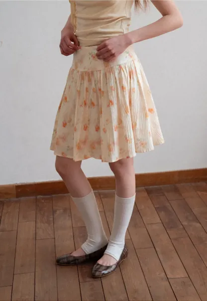 Floral Print Pleated Skirt with Asymmetrical Hem