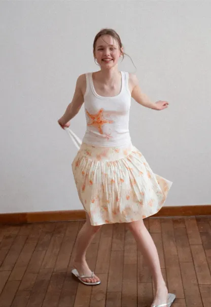 Floral Print Pleated Skirt with Asymmetrical Hem