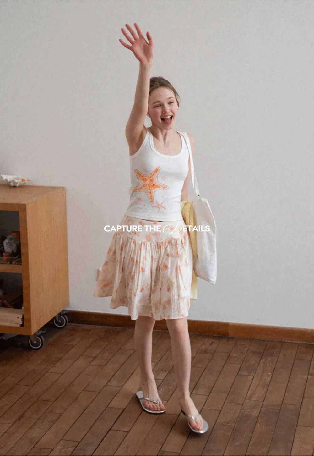 Floral Print Pleated Skirt with Asymmetrical Hem