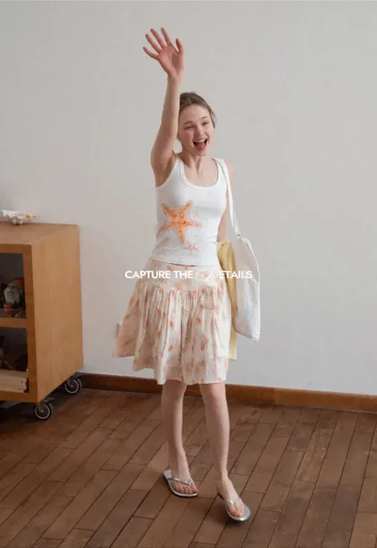 Floral Print Pleated Skirt with Asymmetrical Hem