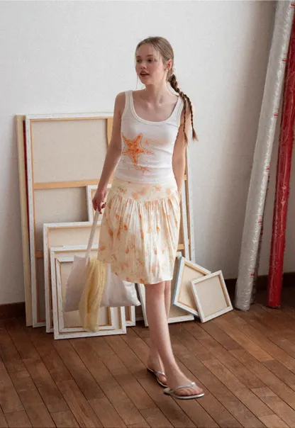 Floral Print Pleated Skirt with Asymmetrical Hem