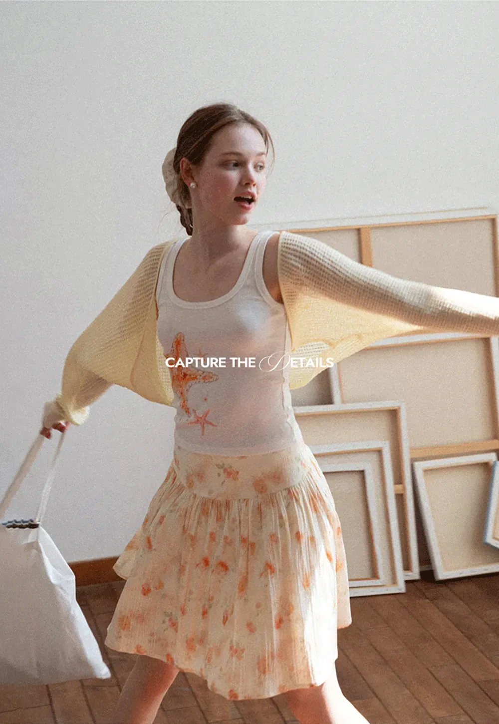 Floral Print Pleated Skirt with Asymmetrical Hem