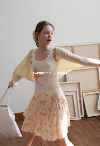 Floral Print Pleated Skirt with Asymmetrical Hem