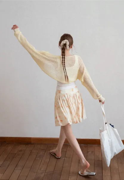 Floral Print Pleated Skirt with Asymmetrical Hem