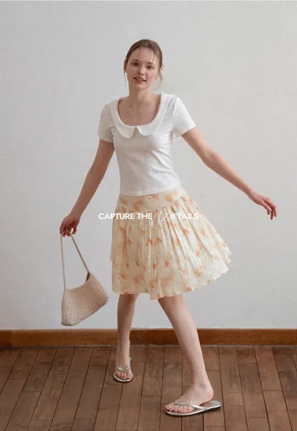 Floral Print Pleated Skirt with Asymmetrical Hem