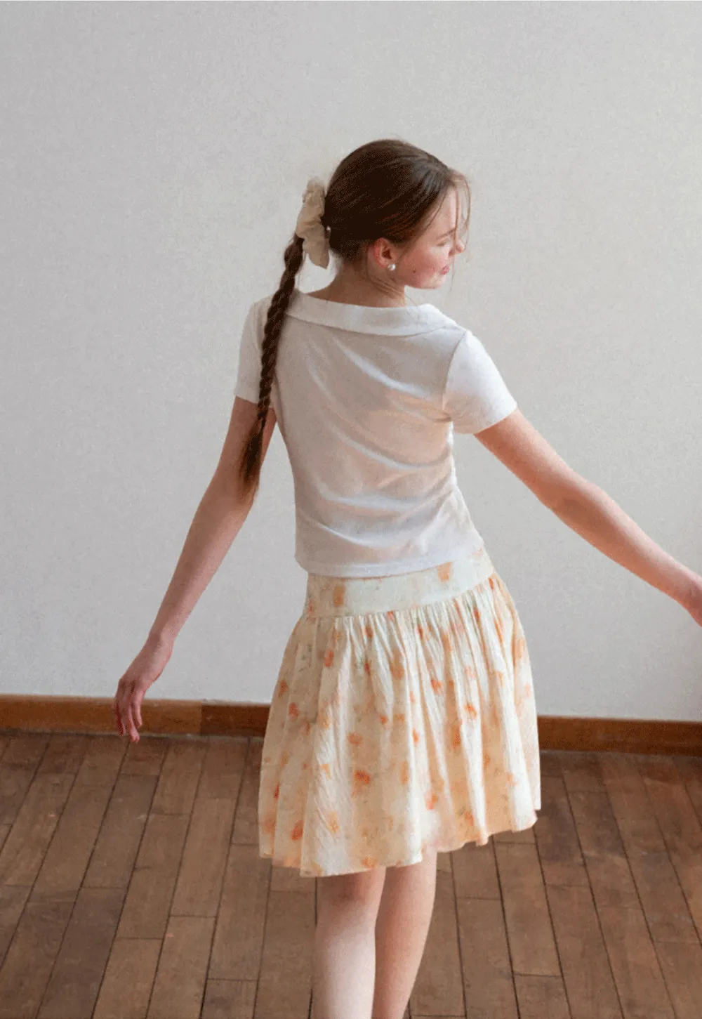 Floral Print Pleated Skirt with Asymmetrical Hem