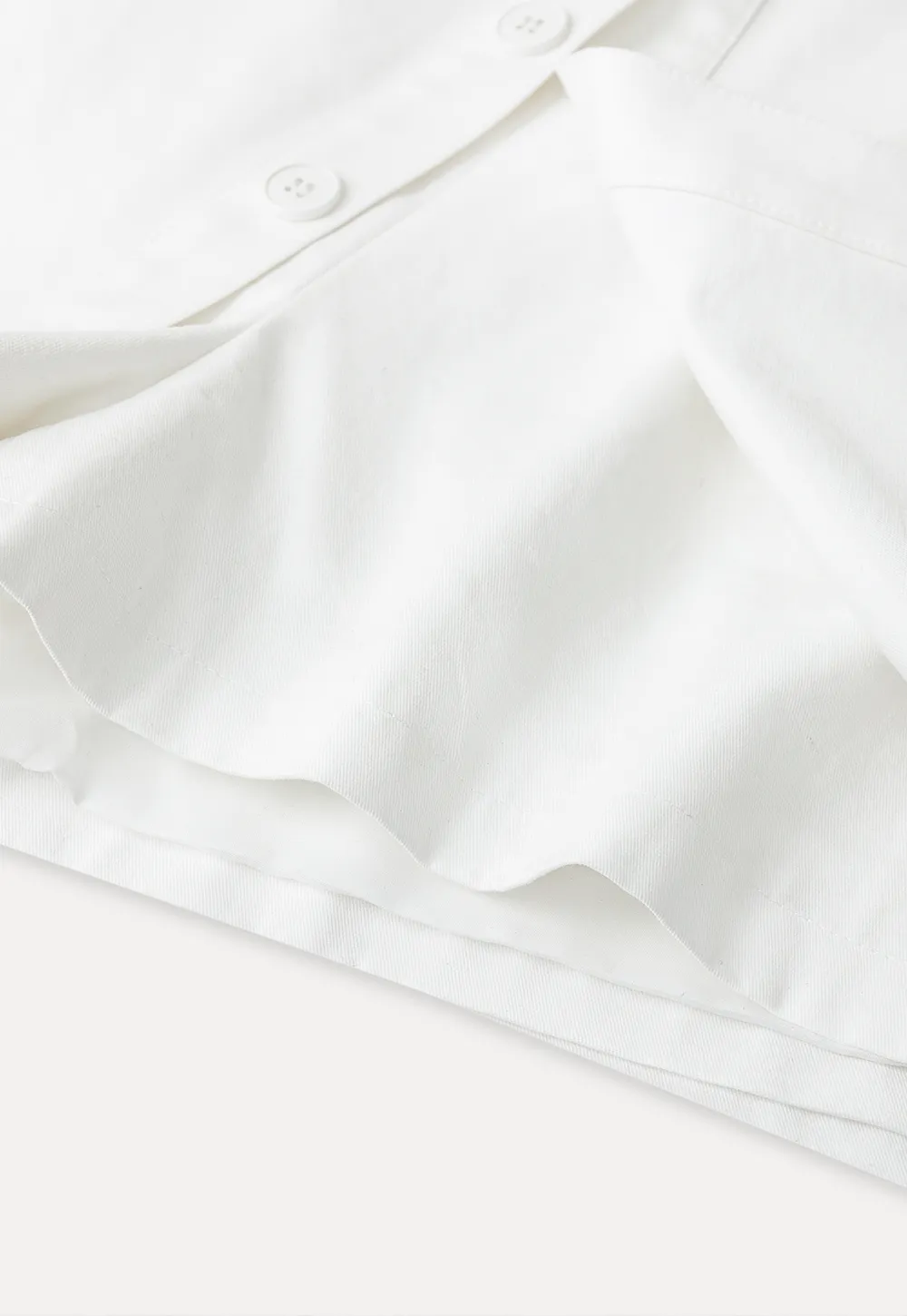 Button Front Mini Skirt with Asymmetrical Hem