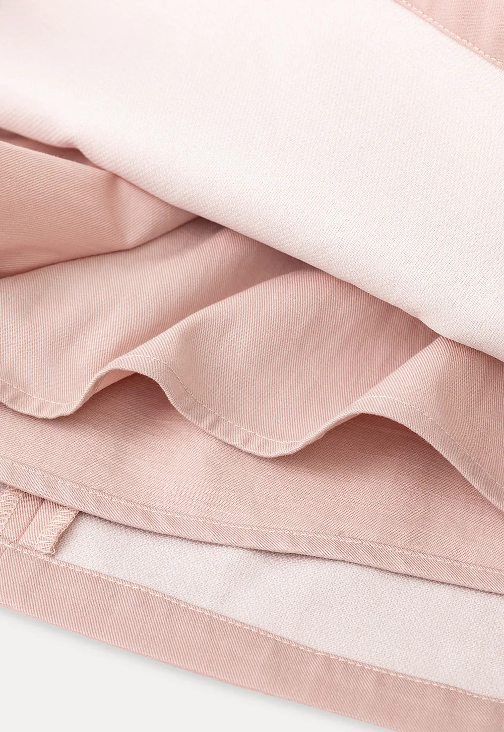 Short skirt with lace trim and button front