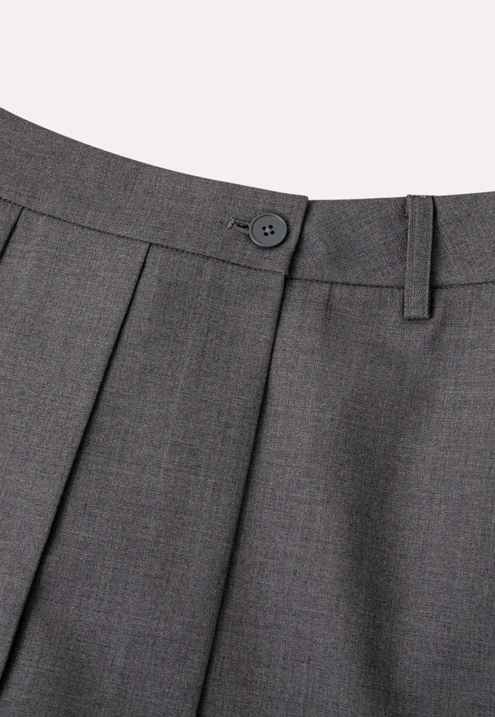 Pleated skirt with front button closure