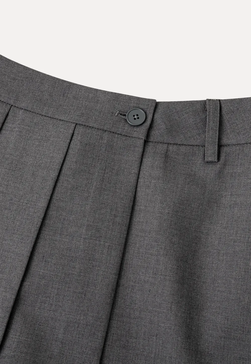 Pleated skirt with front button closure